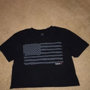 black reebok crop top with american flag on it.